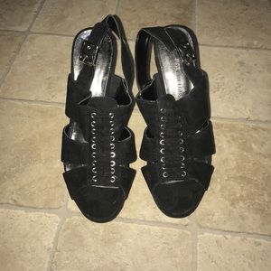 Black strappy platforms.