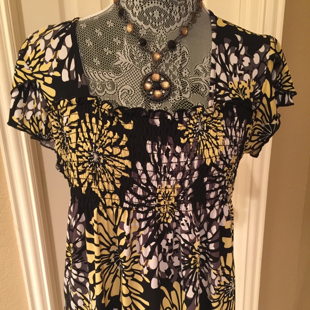 Flower-detailed top.