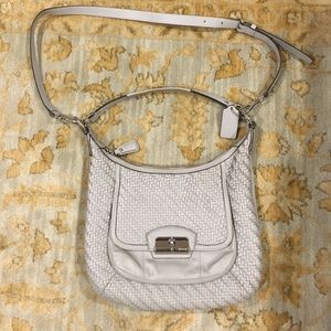 Medium sized gray leather Coach purse