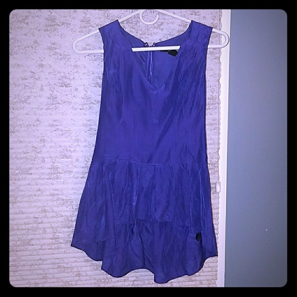 Sleeveless purple blouse
