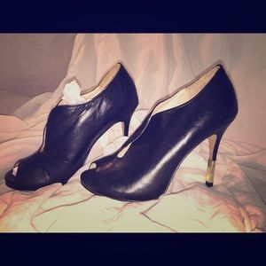 Pour La Victoire peep toe open-arch booties.