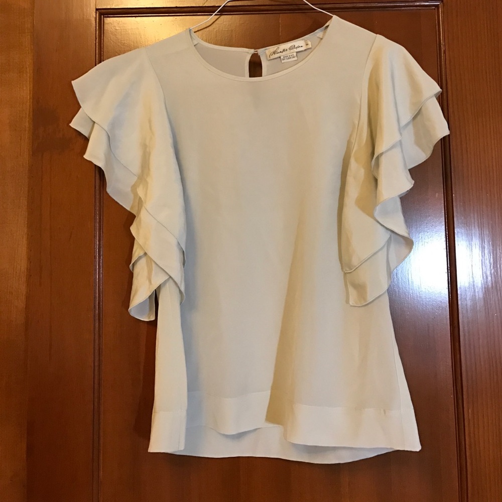 Chiffon light gray shirt.