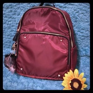 NWT Backpack with fur pompom