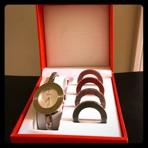 Coach gallery watch with interchangeable bezels.