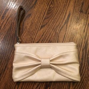 Shimmering Ivory Bow Wristlet