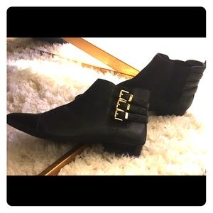 Chic ankle booties with gold detailing 👑