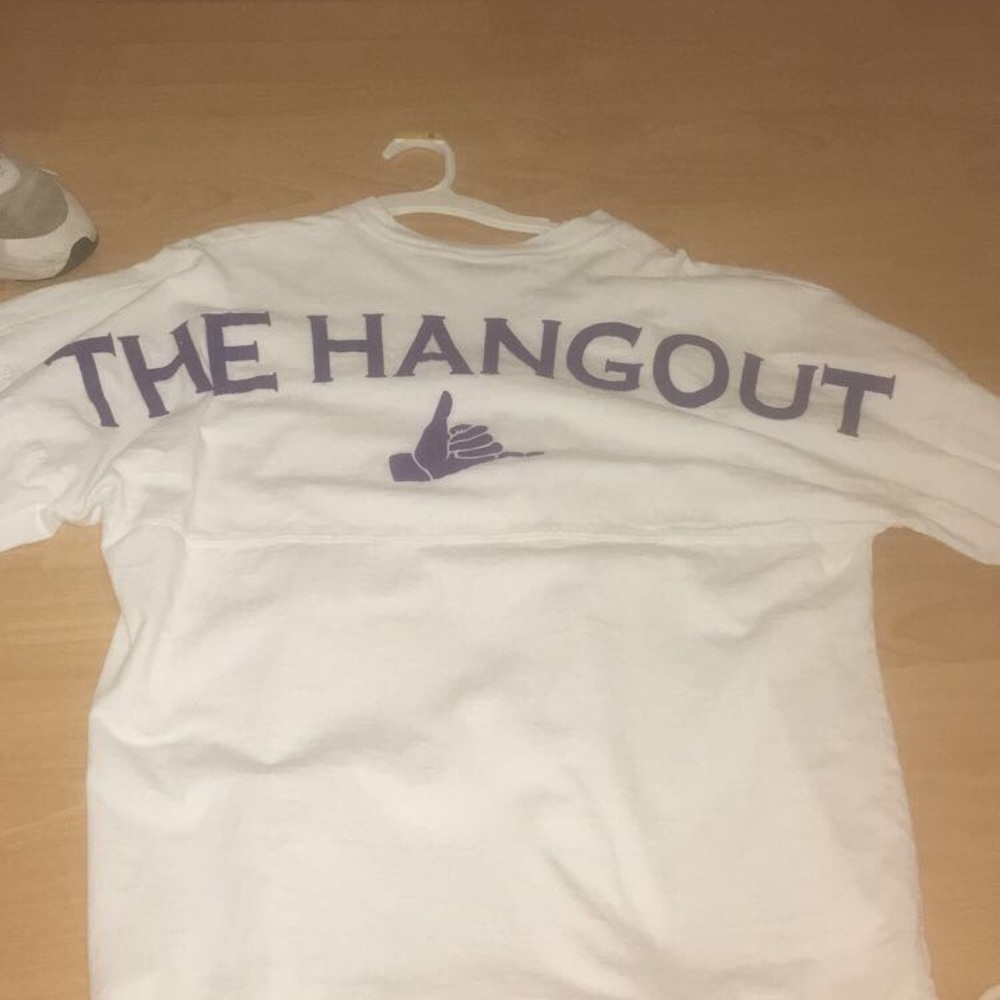A white Hangout long sleeve shirt