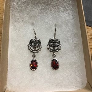Silver and red dangling earrings