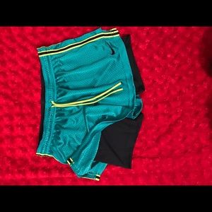 NIKE size M shorts with attached bike shorts