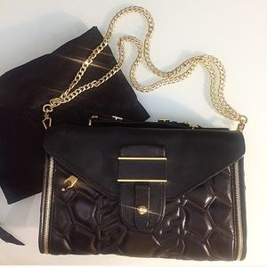 Rebecca Minkoff quilted black purse.