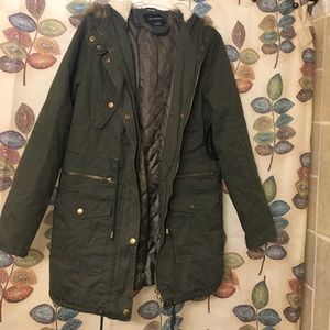 Jacket with faux fur hoodie.