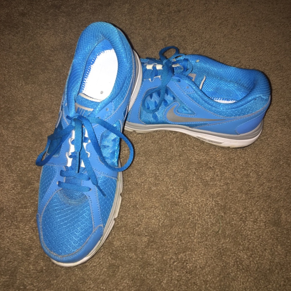 Bright blue Nike running shoes