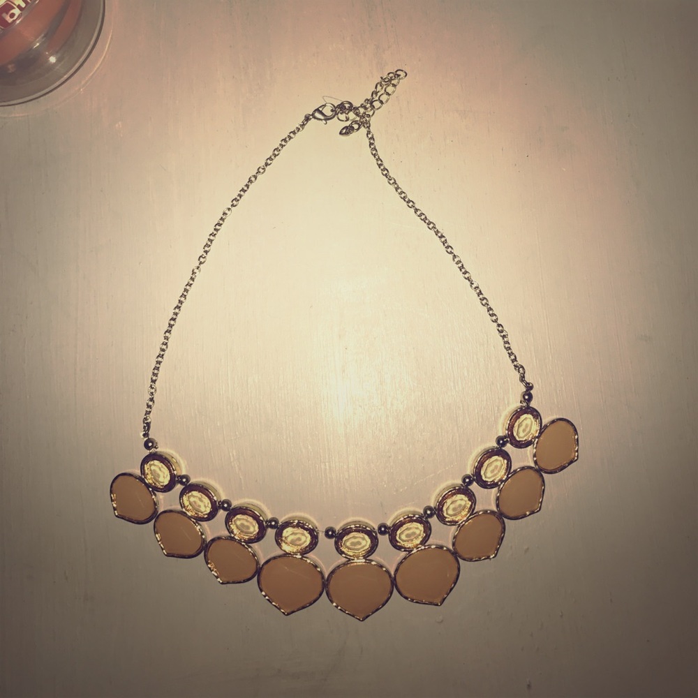 Statement piece! Perfect to wear with a blouse!