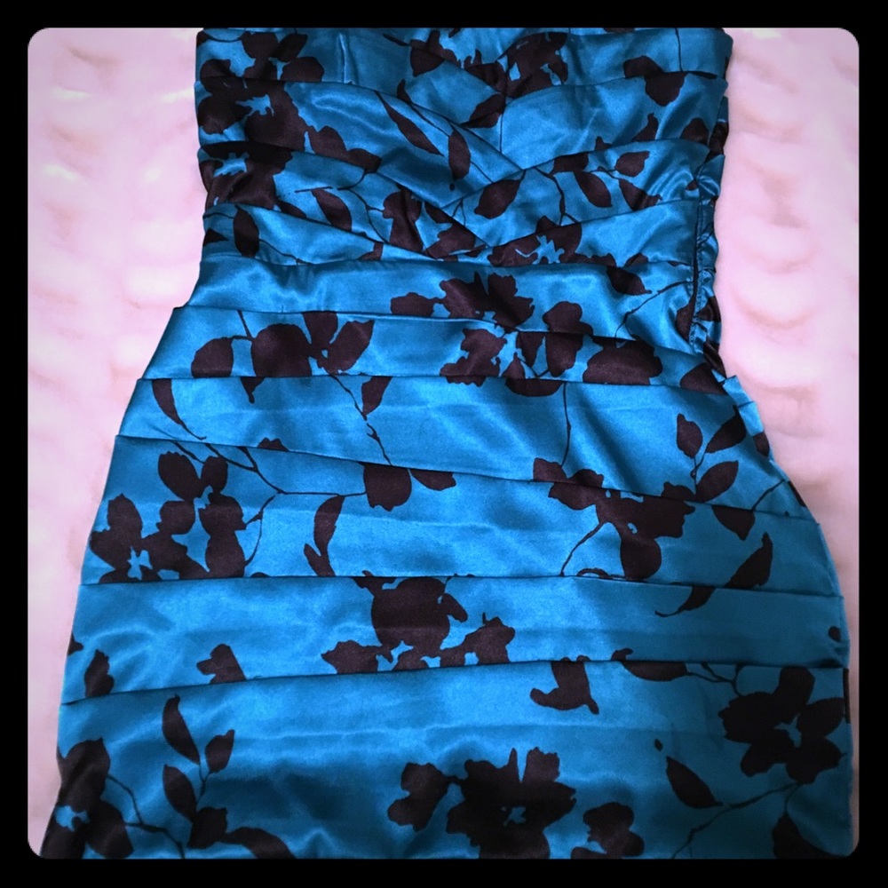 Turquoise and black dress