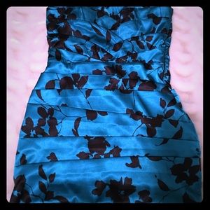 Turquoise and black dress