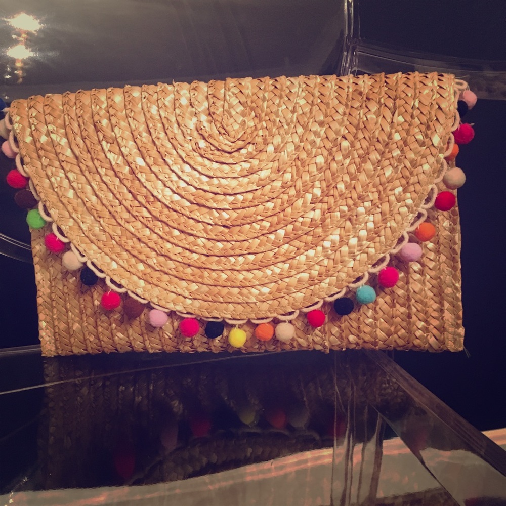 Pom Pom and straw clutch