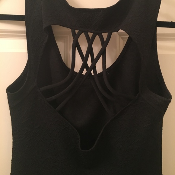 Black Peplum Top with Cut-Out Back - Picture 3 of 4