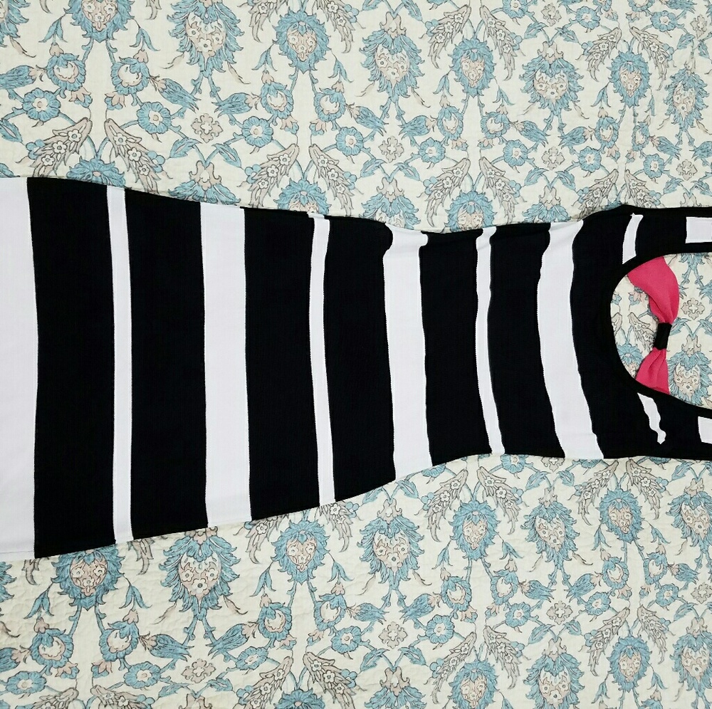 2/$10 on anything priced under $10!!! Black and white fitted dress