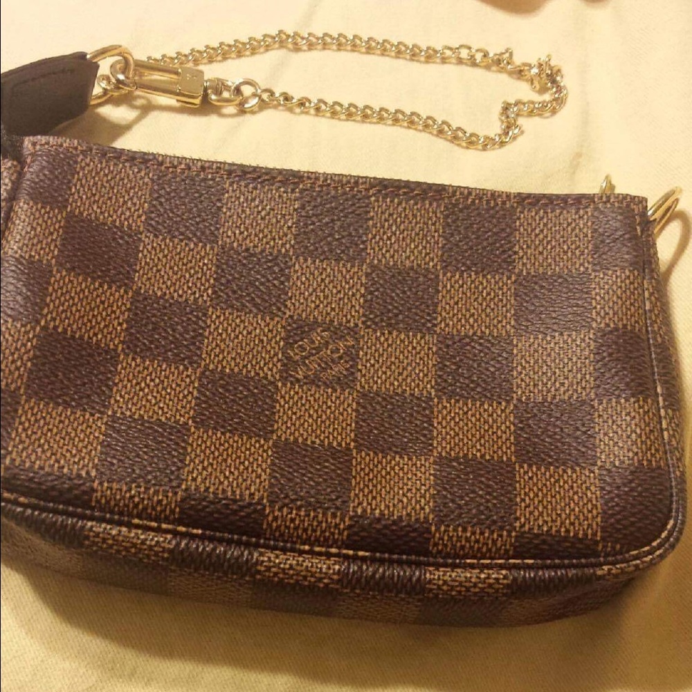 Louis Vuitton wristlet..