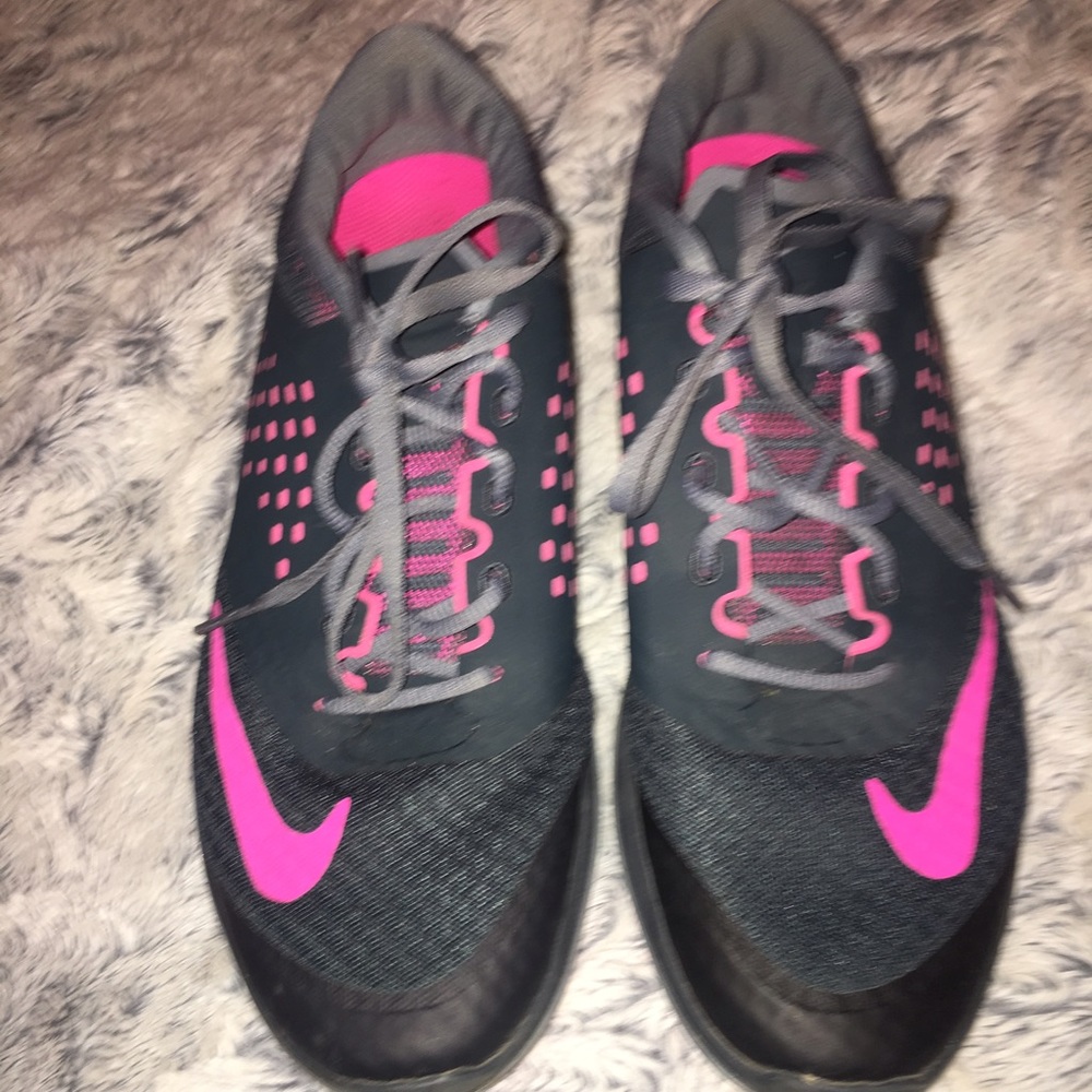 Gray and pink Nike shoes