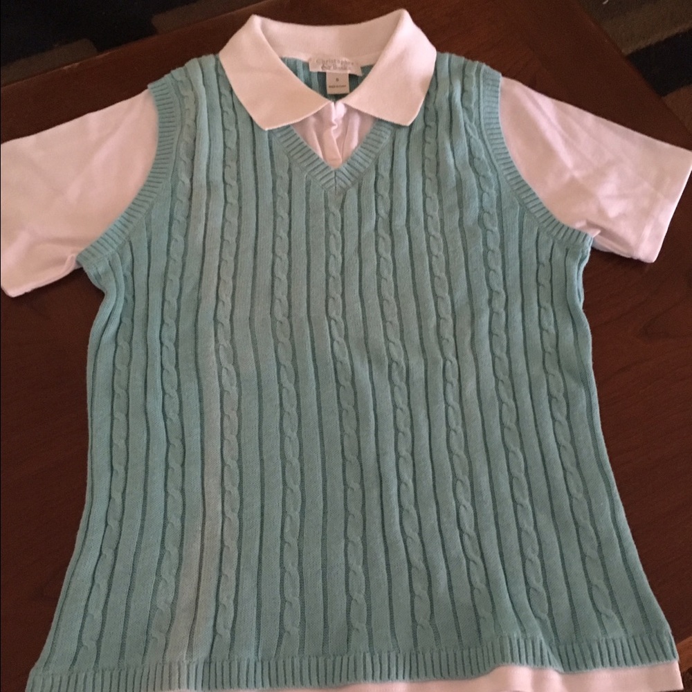 Turquoise and white shirt.