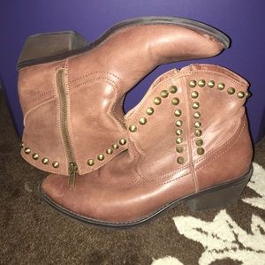 Brown and gold booties