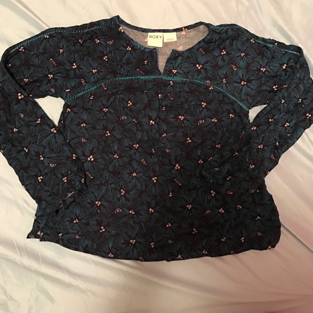 Cute Roxy Girl shirt. NEVER used