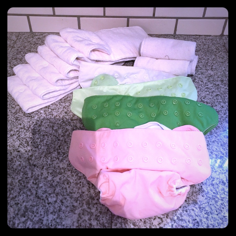 4 cloth diapers, 6 thick inserts, 3 light inserts