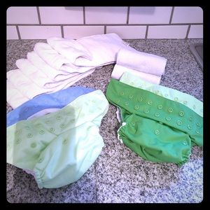 4 cloth diapers, 6 thick inserts, 3 light inserts
