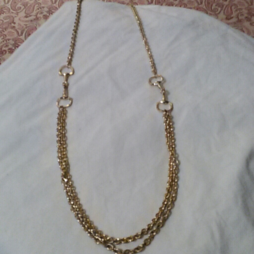 Gold equestrian necklace