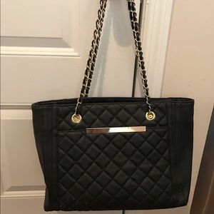 black faux leather quilted bag