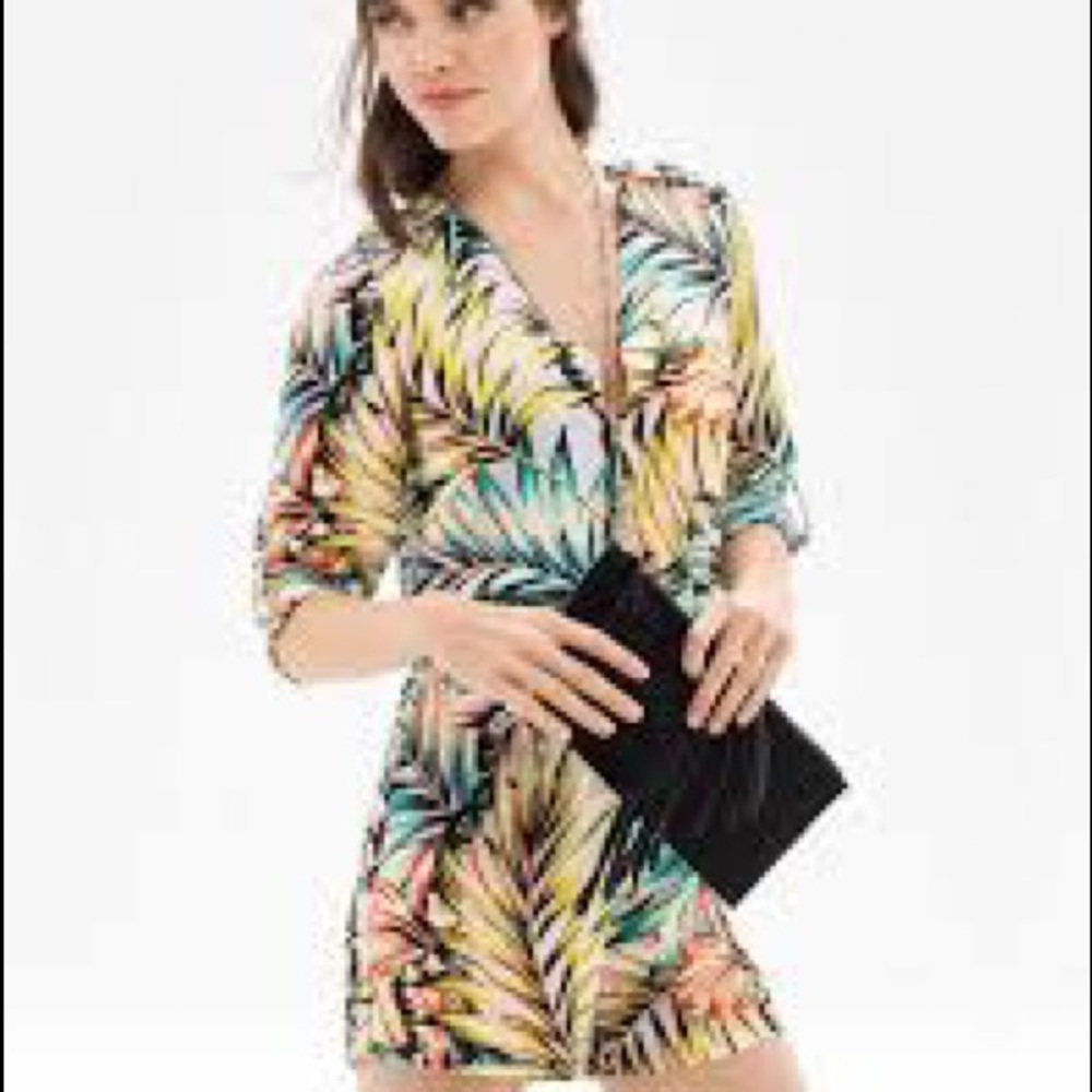 Limited flattering tropical Romper