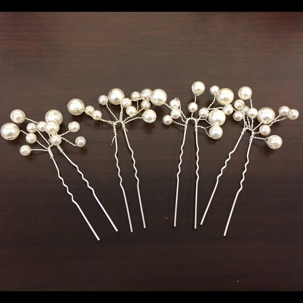 Four (4) Pearl silver hair pins