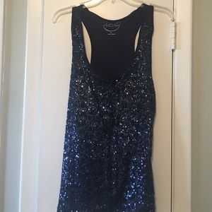 Navy blue with sequin top. Wore once for NYE