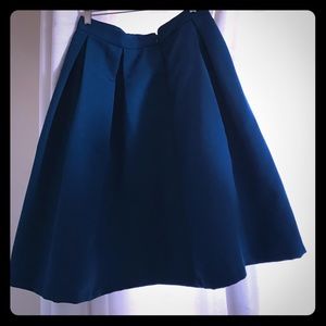 Tea-length skirt with pockets