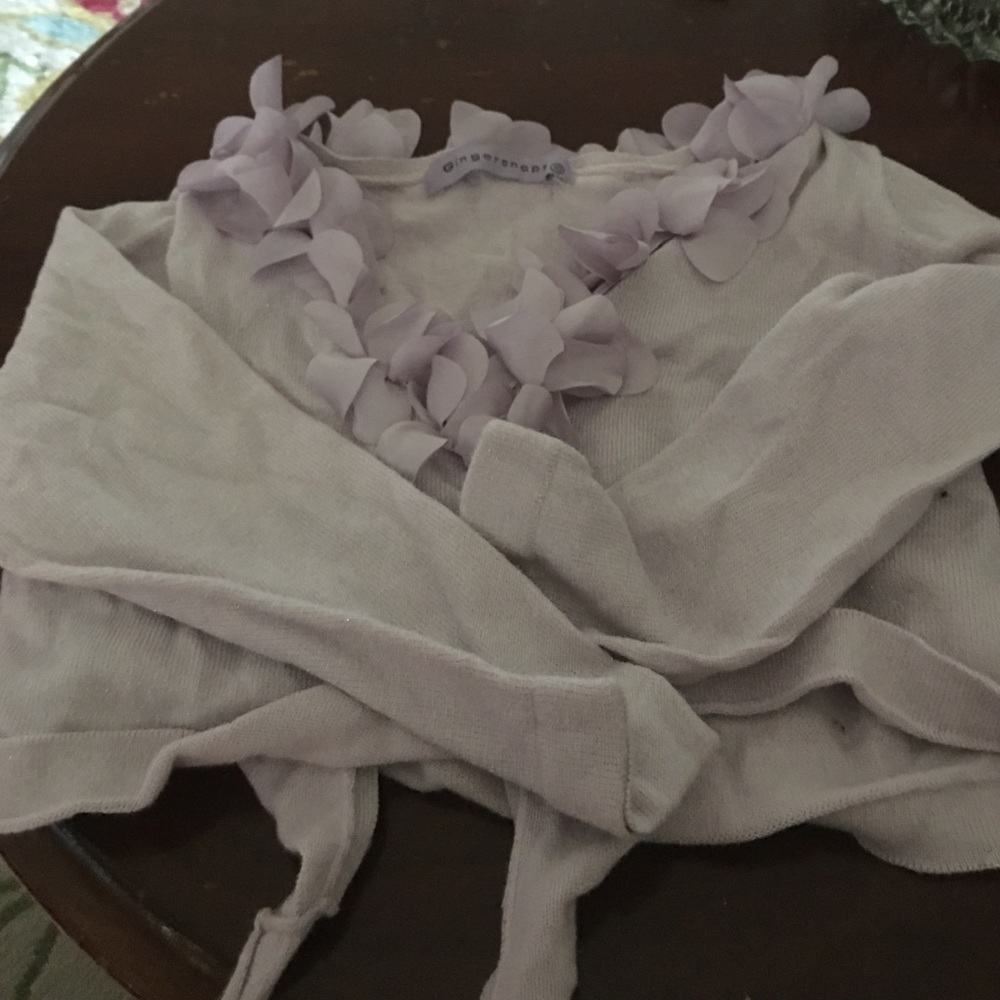 A purple wrap around sweater for a girl 10yo girl
