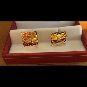 Gold cufflinks