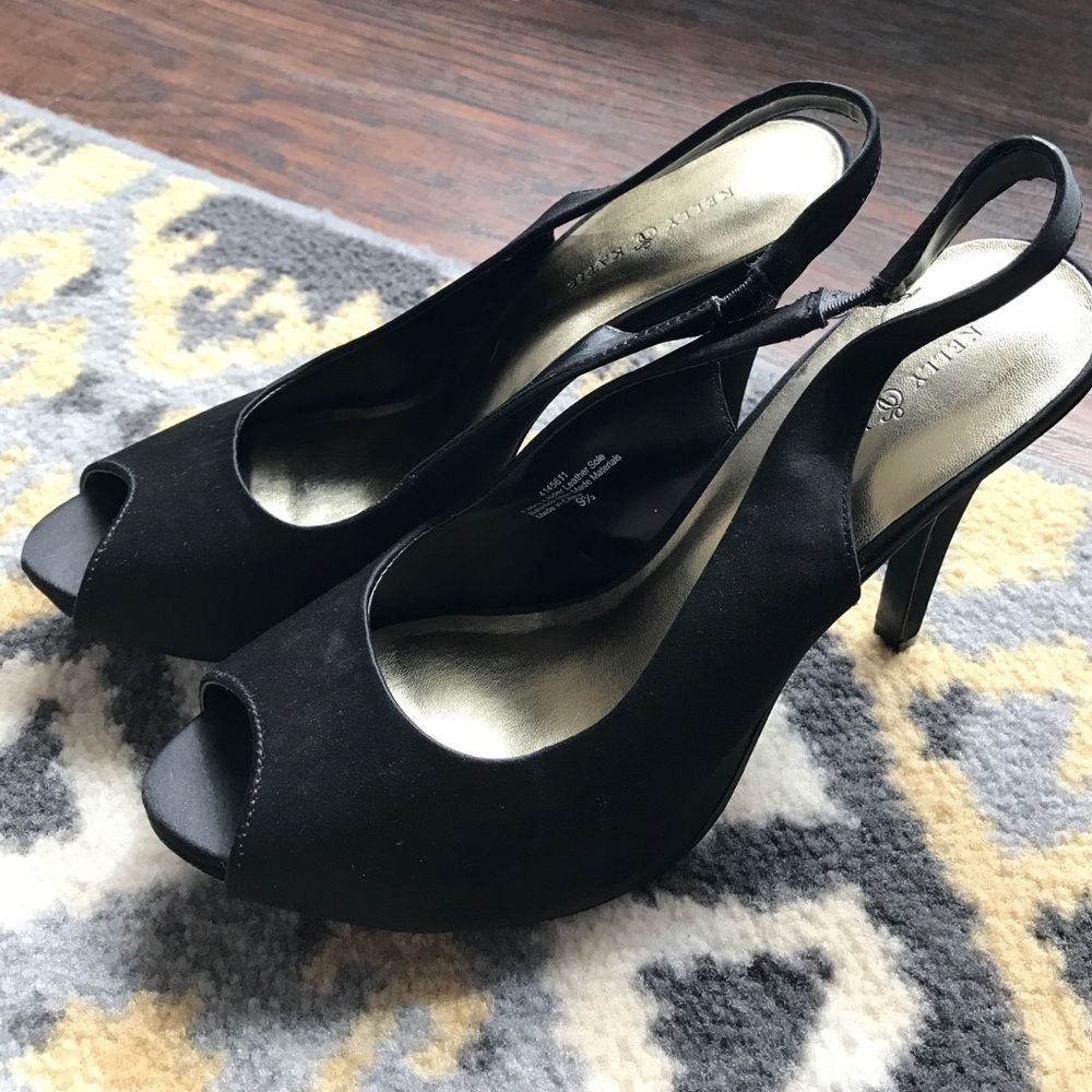 Black satin slingback pumps