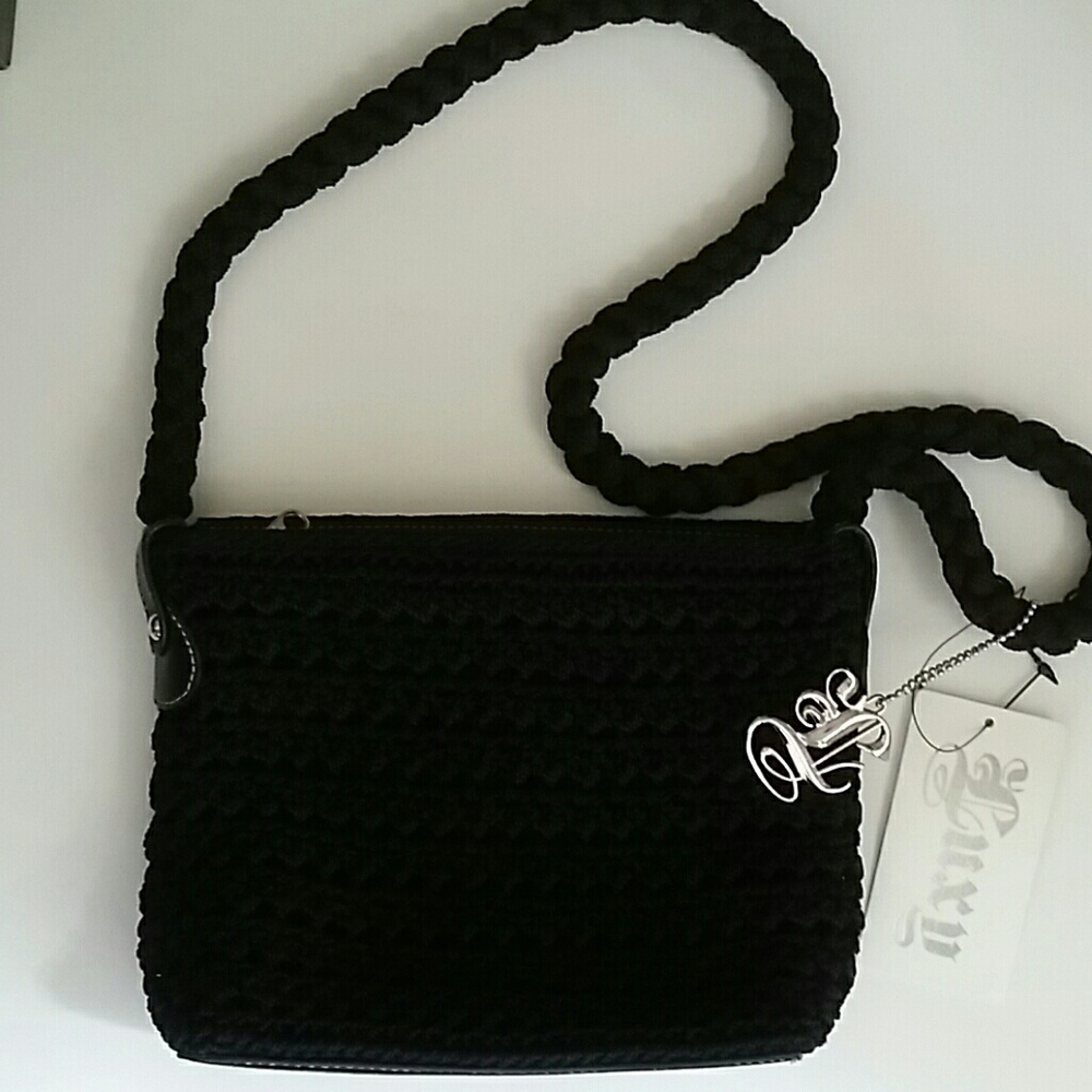 LUXY CROSSBODY NWT.