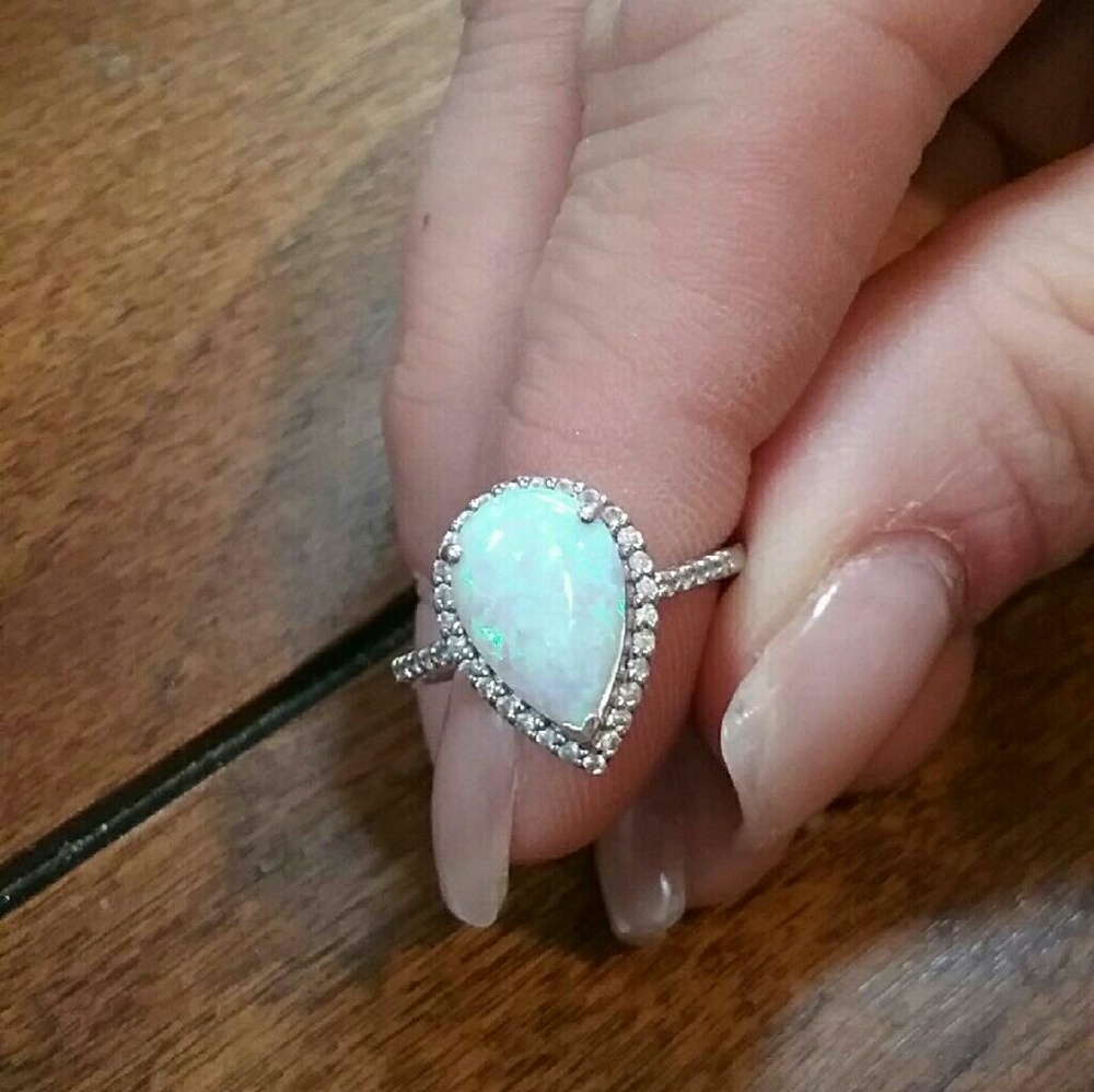 Huge opal and diamond ring set in sterling silver