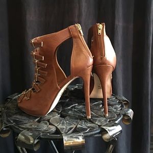 Brown and gold heels.