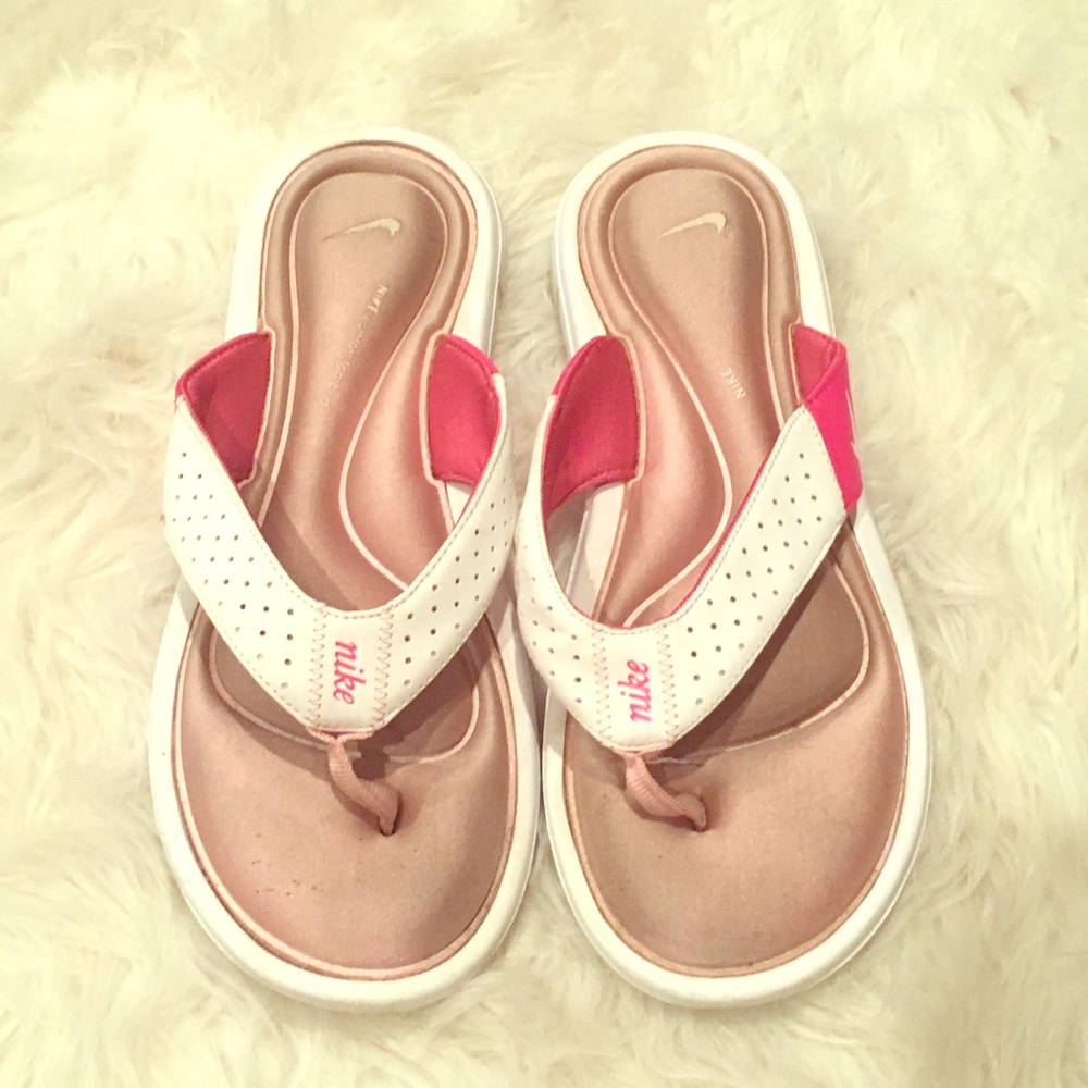 Nike Flip Flops.