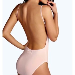 Tan body suit with open back