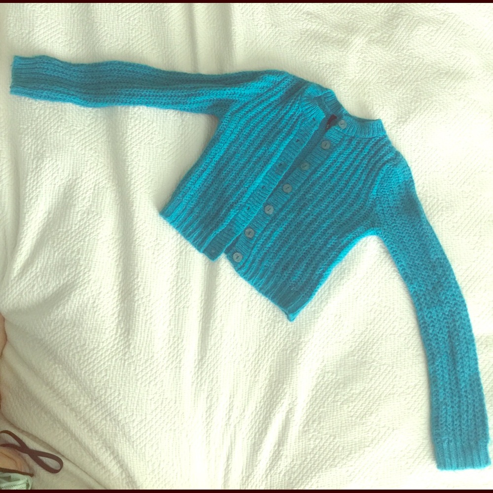 Teal blue cozy fitted sweater.  Like new.  small