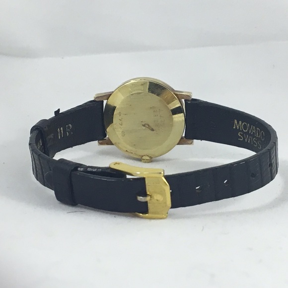 Movado 14 k solid gold ladies watch