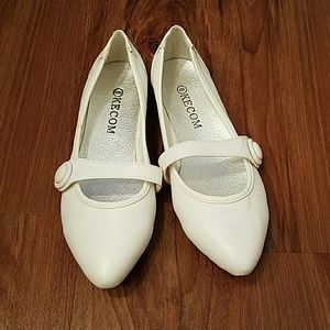 White pointed flats