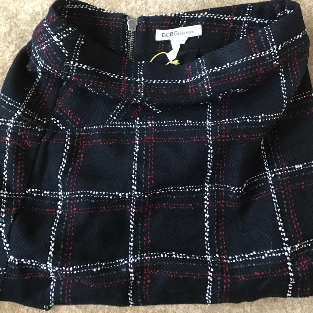 Never worn BCBG size 4 Mini skirt black,red,white