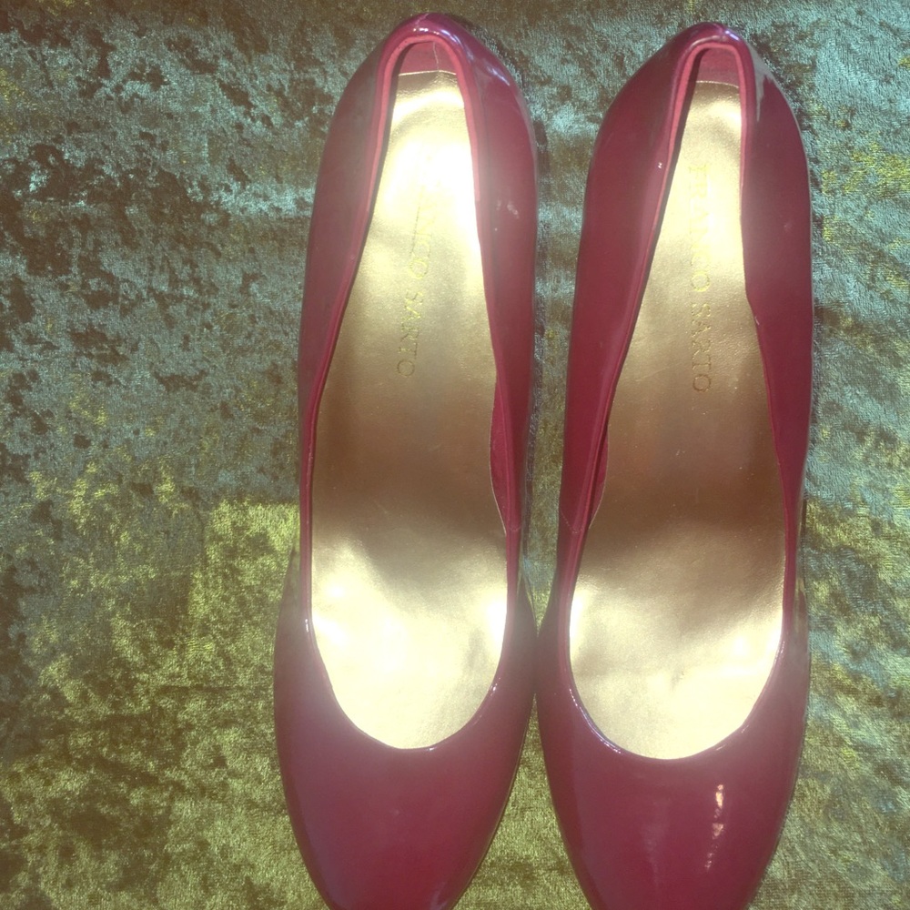 Crimson patent leather pumps