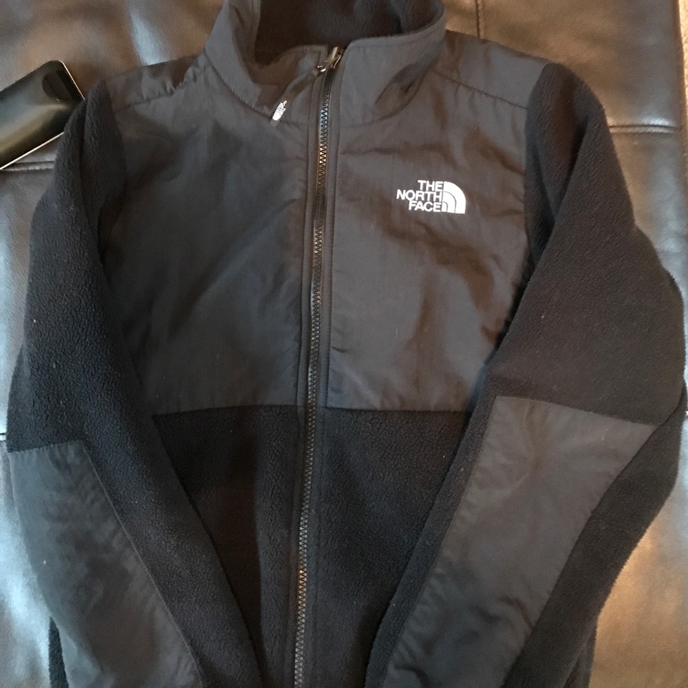 Black north face jacket, size 10-12.