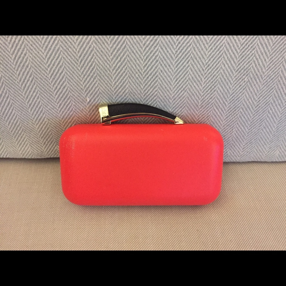 Vince Camuto neon pink leather horn clutch